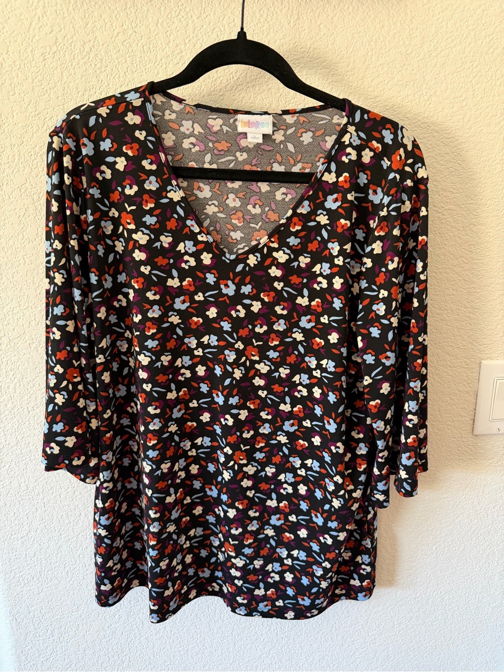 LuLaRoe Black V-Neck Tunic with Red, Blue, Cream & Orange Floral Print
